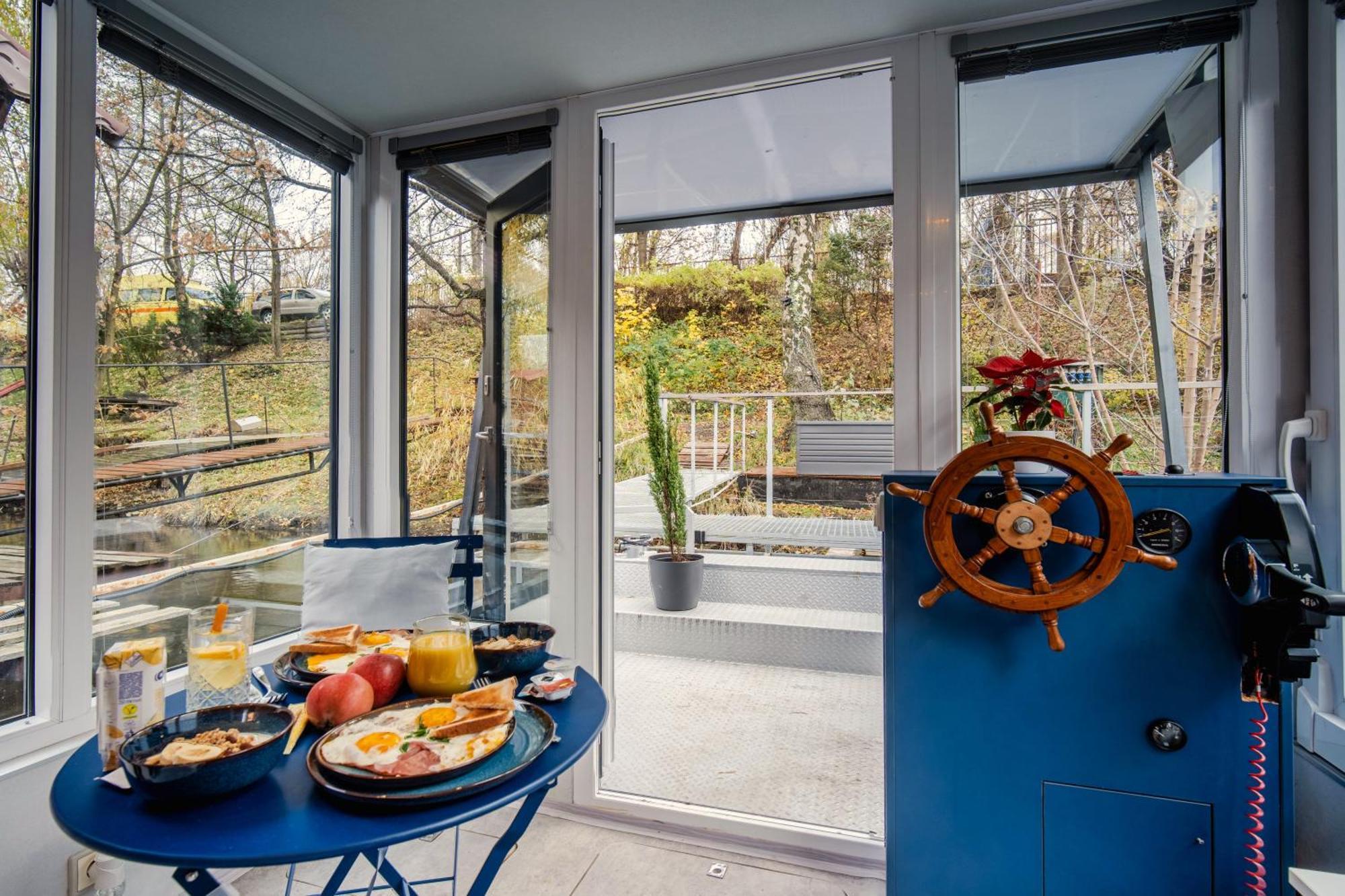 Botel Houseboat Neptun With Paddle Boat - On The River